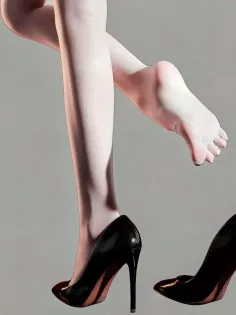 Pair of legs with one foot in a black high heel and the other bare