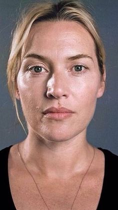 Woman with blonde hair and a black top in a close-up portrait