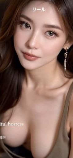 Woman with long brown hair and earrings, showing cleavage