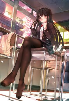 Anime girl in a school uniform sitting on a desk in a classroom at sunset