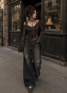 Woman in dark academia style clothing walking on a street