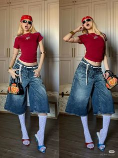 Woman in a red top, wide leg jeans, and a red bandana posing indoors