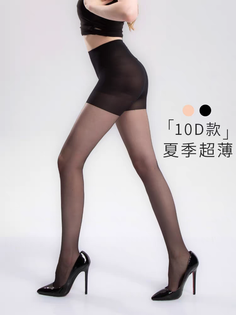Woman in black tights and high heels posing in a studio