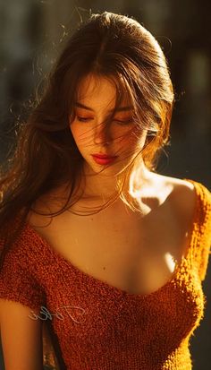 Woman with long hair and red lipstick in an off-shoulder top at golden hour