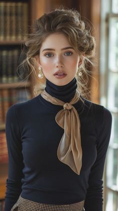 Woman in a black turtleneck and silk scarf with an updo hairstyle