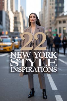 Woman in a long coat and pantsuit standing on a city street