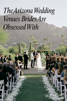 Outdoor wedding ceremony with a bride and groom exchanging vows in a desert landscape