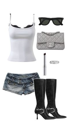 A collection of clothing and accessories including a white camisole and denim shorts