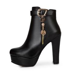 Black ankle boots with high heels and gold zipper detail