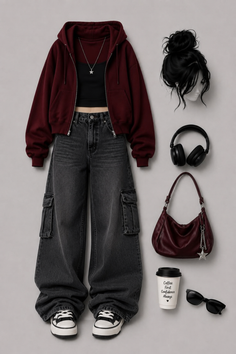 Flat lay of a casual outfit with a maroon hoodie and black cargo pants
