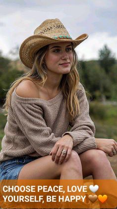 Woman in a cowboy hat and off-shoulder sweater outdoors