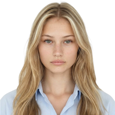 Young woman with blonde hair and green eyes wearing a blue shirt