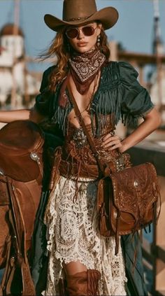 Woman in a cowboy hat and western attire with a lace skirt and leather accessories