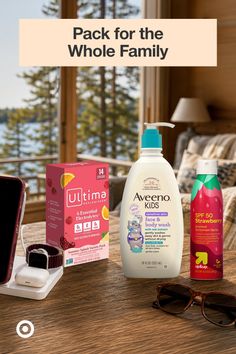 Various family products on a wooden table with a scenic outdoor view