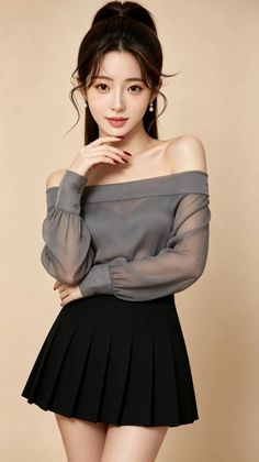 Woman in an off-shoulder top and pleated skirt with a ponytail
