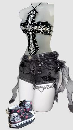 Gothic style outfit on a mannequin with a cross top and skull print shoes