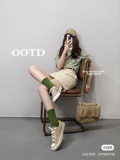 Woman in a striped shirt and mini skirt with a baseball cap and shoulder bag