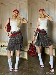 Woman in a red bandana and ruched skirt posing indoors