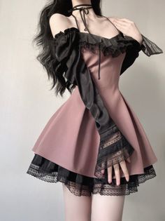 Woman in a pink and black lace off-shoulder dress with a choker