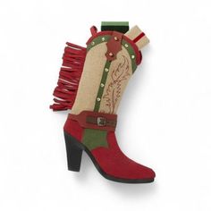 Cowboy boot shaped Christmas stocking with red fringe and embroidery