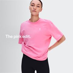Woman in a pink t-shirt and black leggings in a studio setting