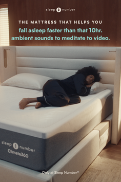 Woman with curly hair sleeping on a mattress in a bedroom