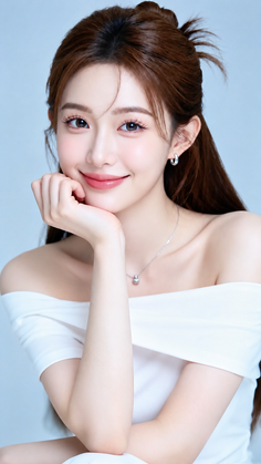 Woman with long brown hair wearing an off-shoulder top and jewelry, smiling