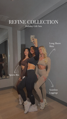 Three women in athletic wear taking a selfie in an indoor setting