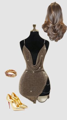 Sparkly gold dress on a mannequin with gold heels, jewelry, and long hair