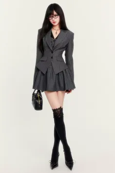 Woman in a pinstripe suit with a mini skirt and thigh-high socks