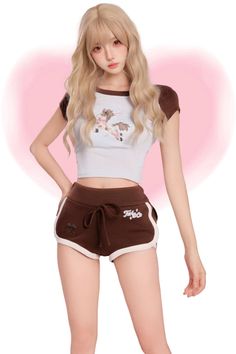 Woman with long blonde hair wearing a crop top and short shorts against a pink background