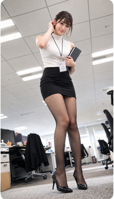 Woman in a mini skirt and pantyhose posing in an office