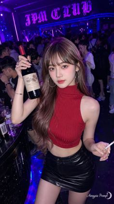 Woman in a red crop top and leather skirt holding a wine bottle in a nightclub
