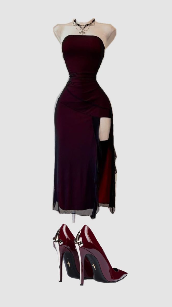 Burgundy strapless dress with a high slit and matching high heels on a mannequin
