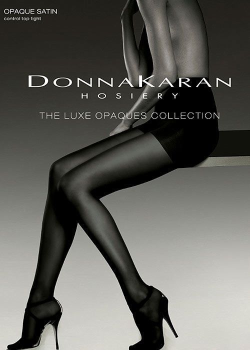 Woman in black tights and high heels with exposed upper body