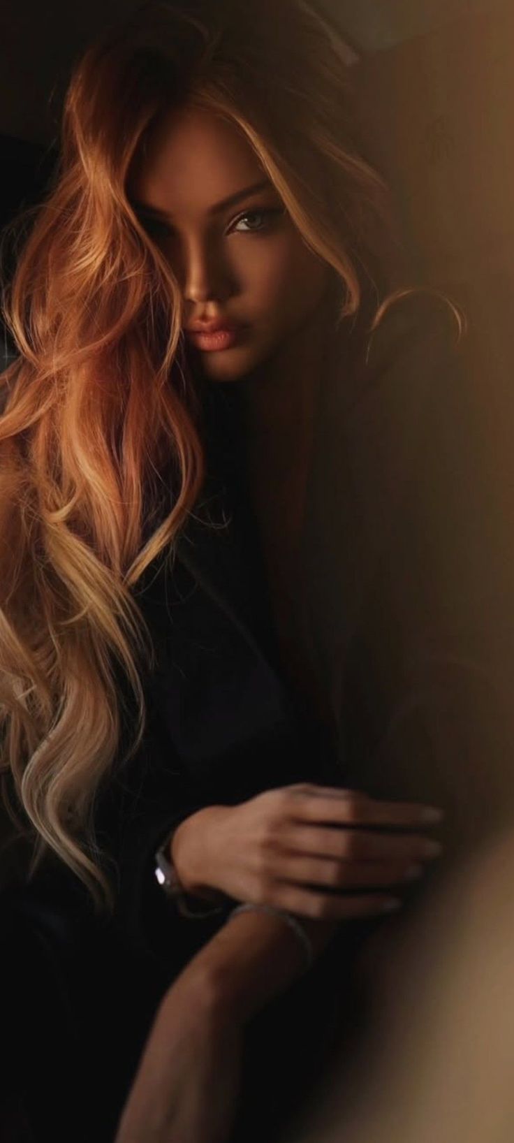 Woman with long blonde hair in a dark, softly lit portrait