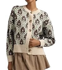 Woman wearing a patterned cardigan and a beige skirt