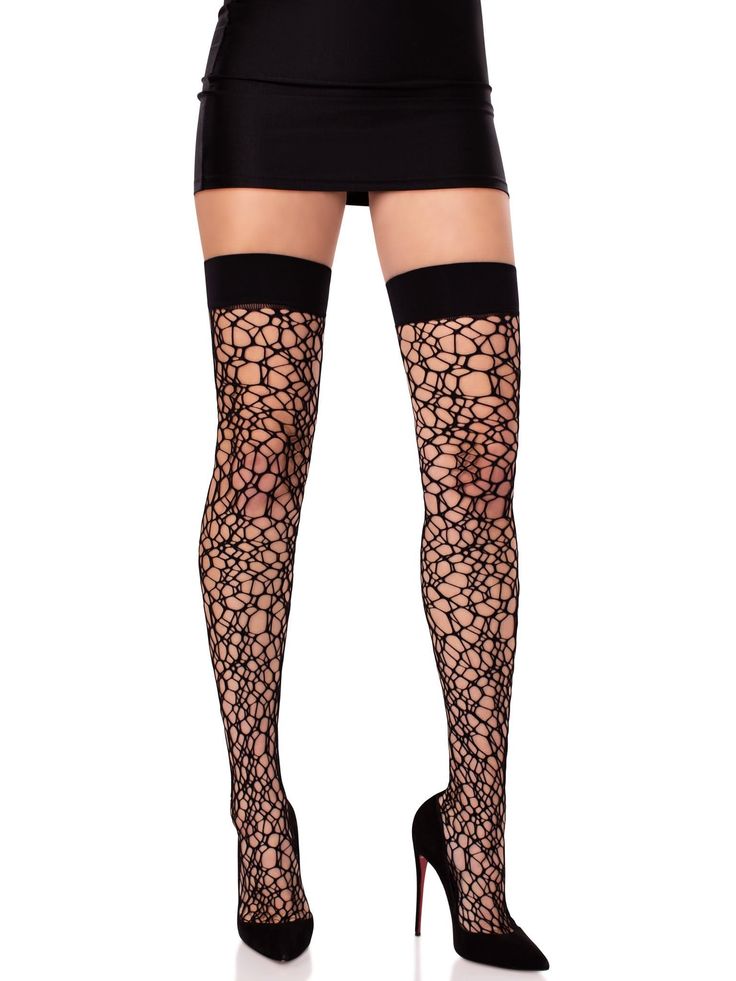 Woman in a black mini skirt, fishnet stockings, and high heels