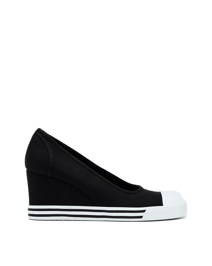 Black canvas wedge shoes with white stripes and a white toe cap