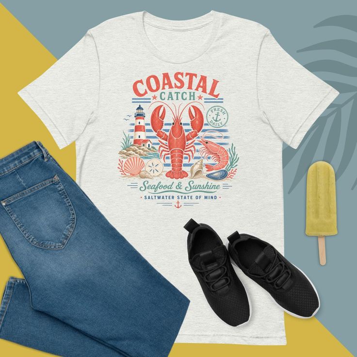 White t-shirt with a seafood graphic, jeans, sneakers, and a popsicle on a two-tone background