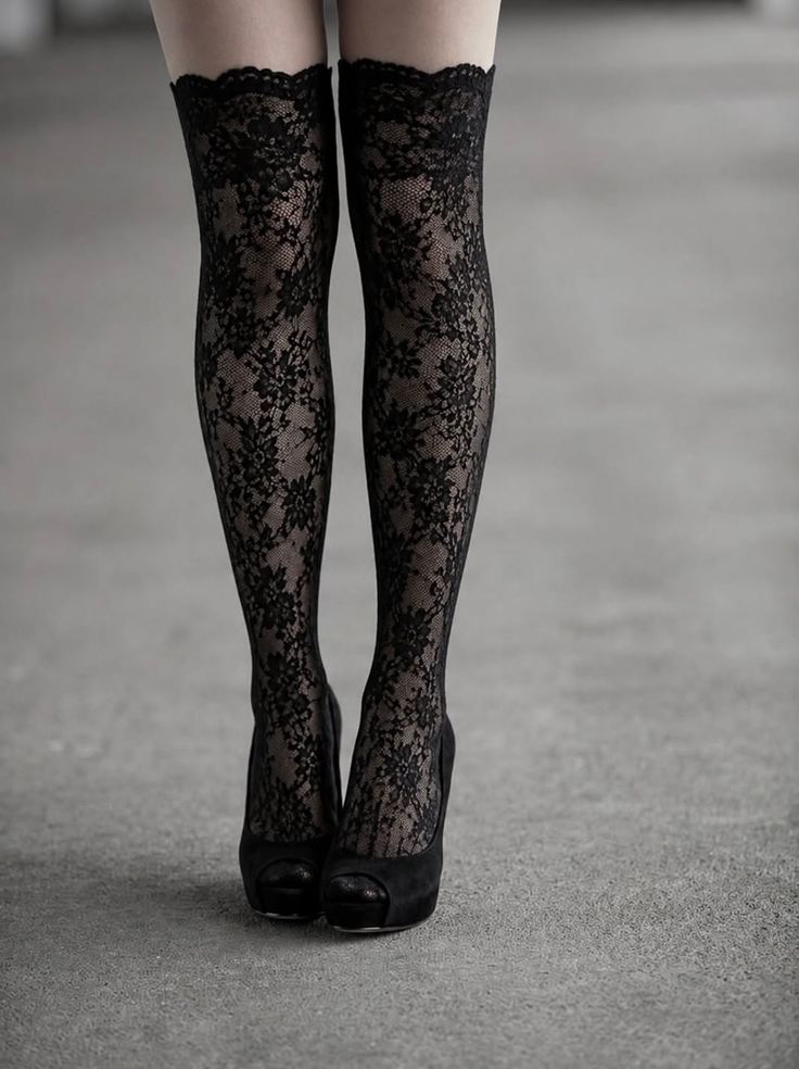 Woman wearing black lace stockings and peep-toe heels