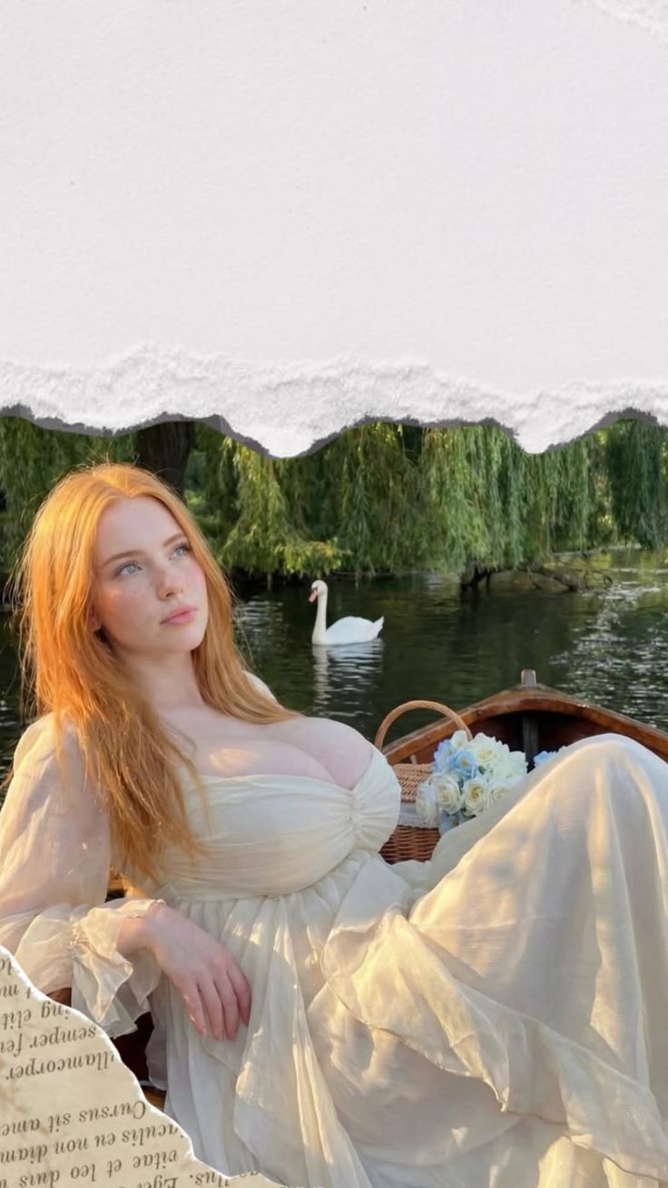 Woman with long red hair in a white dress on a boat with a swan on the river