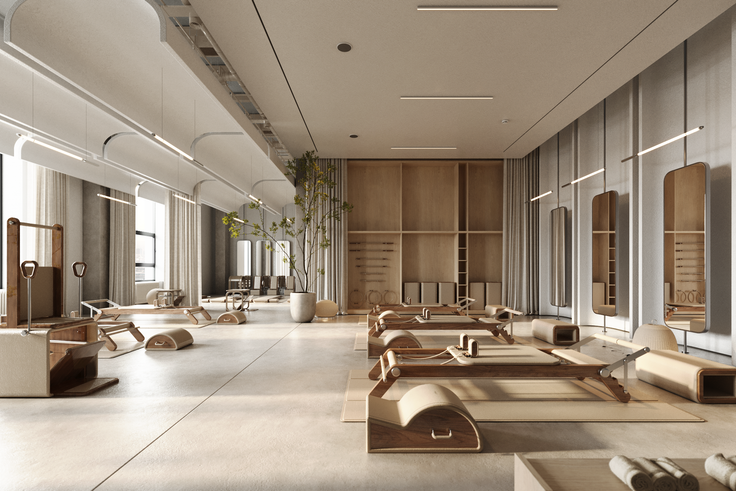 Modern pilates studio with wooden equipment and minimalist design