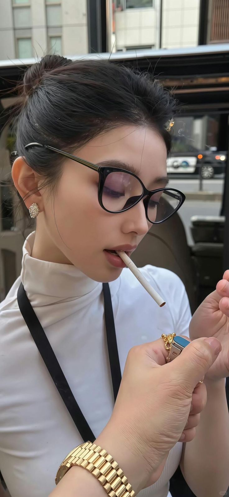 Woman in a white turtleneck and glasses lighting a cigarette outdoors