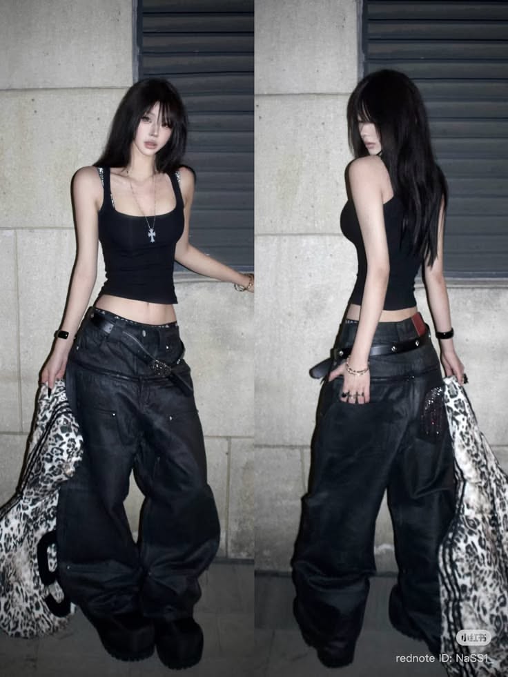 Woman with long black hair in a black tank top and baggy pants holding a leopard print bag