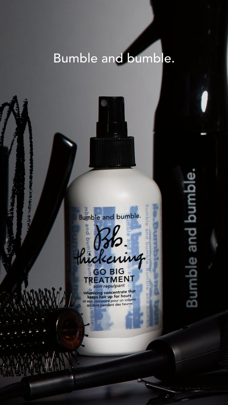 Hair thickening treatment spray bottle with a hair brush and other hair tools