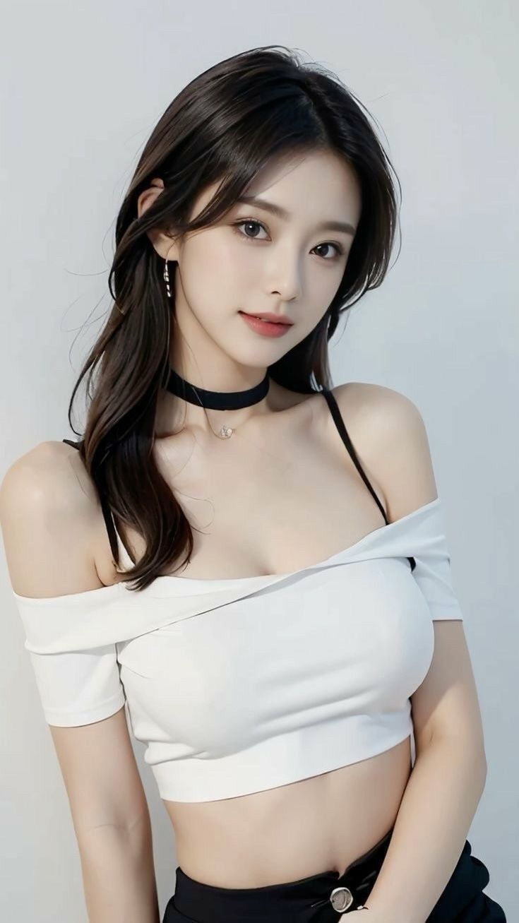 Woman with long dark hair wearing an off-shoulder top and choker