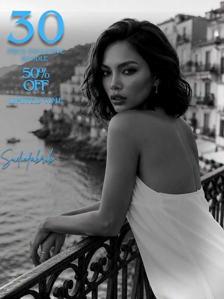 Woman in a white dress on a balcony overlooking a cityscape and the sea