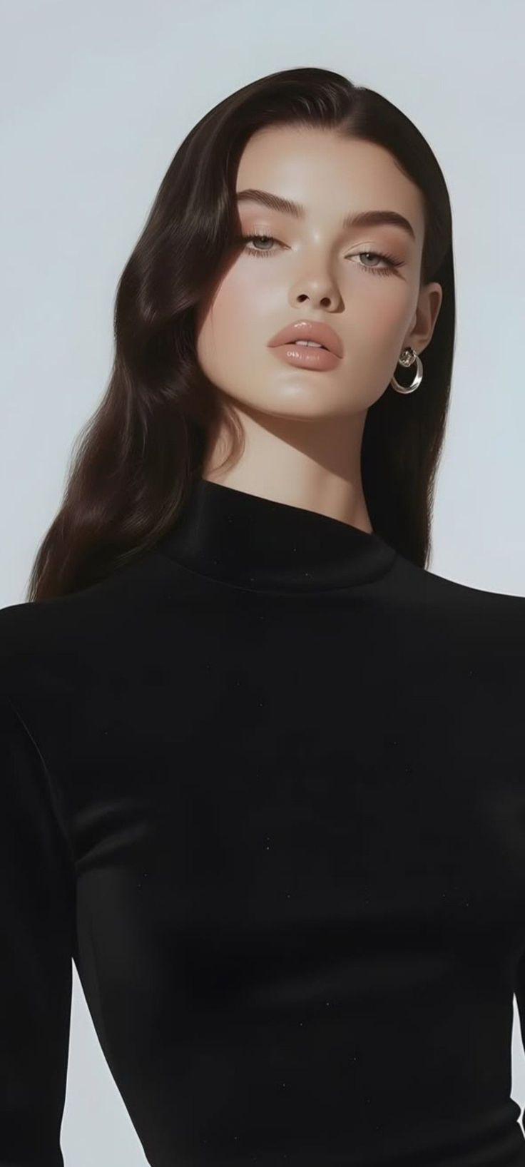 Woman with long dark hair wearing a black top and hoop earrings