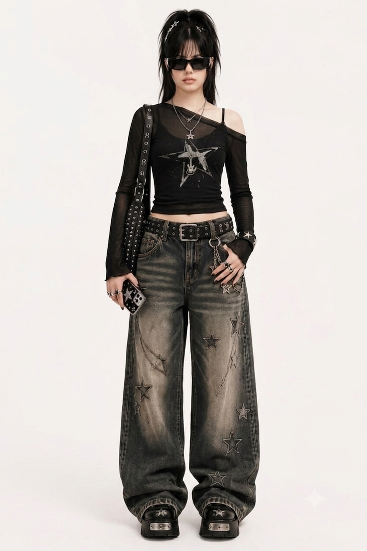 Woman in a black long sleeve top and baggy jeans with star details